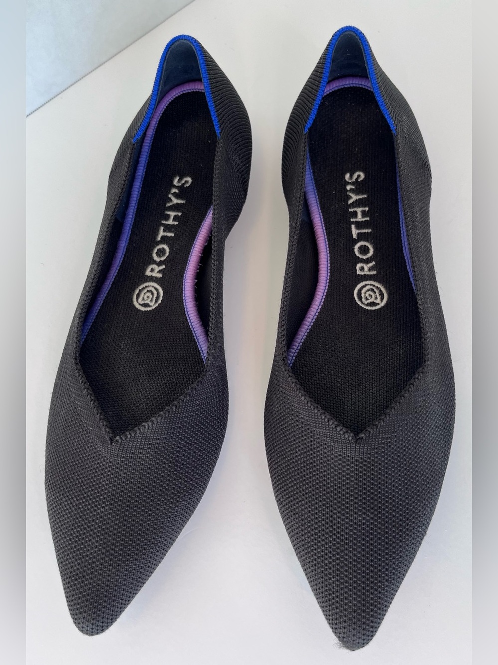 Rothy's Black Flats with Blue and Purple Trim
